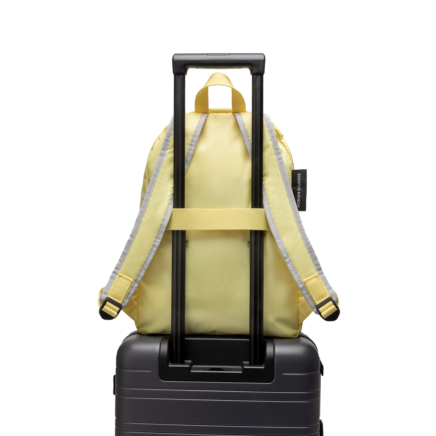 Daypack Medium Glossy Lemon Trolley Rückseite - Horizn Studios